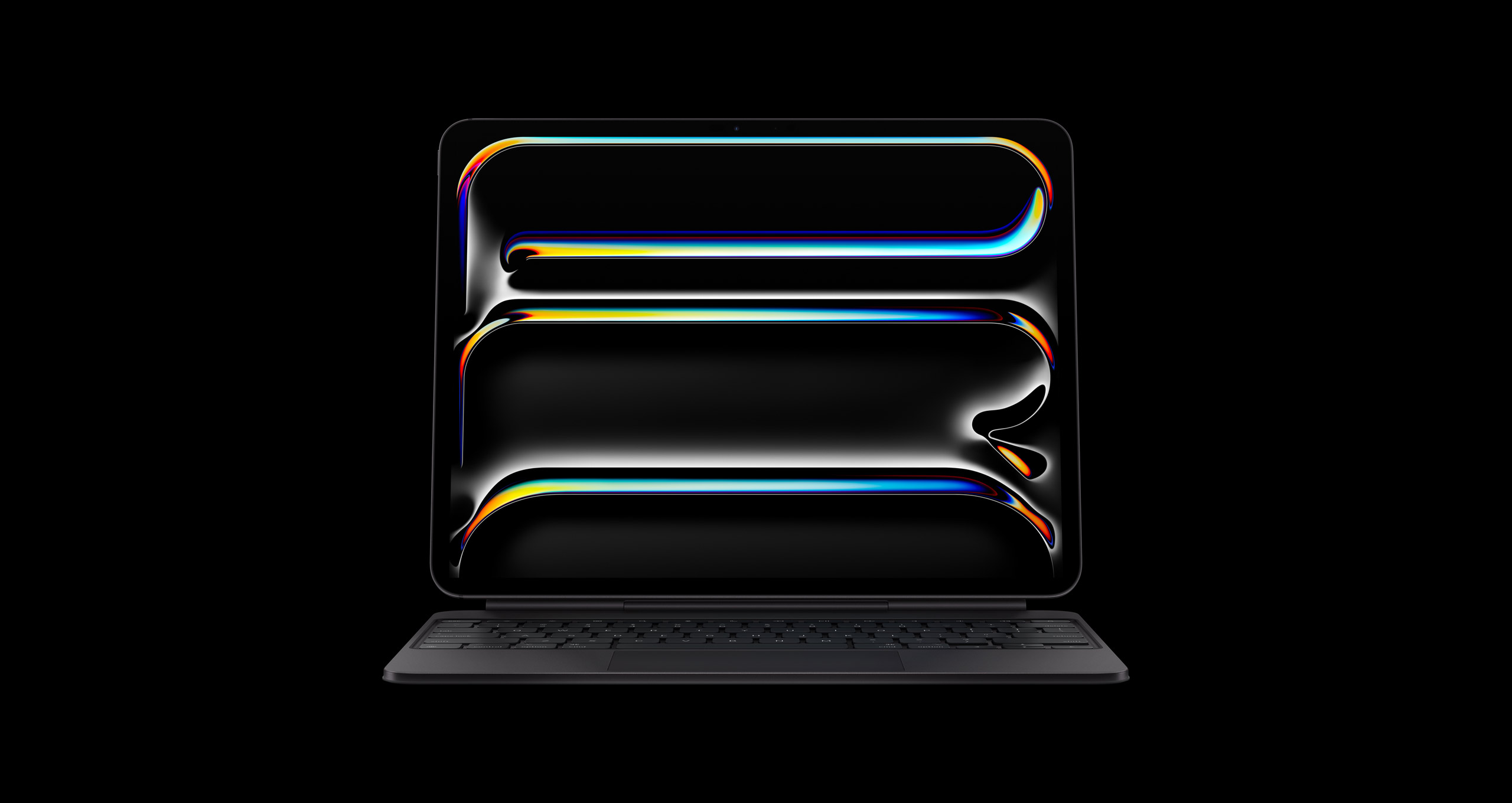 iPad Pro with Magic Keyboard in black on black background