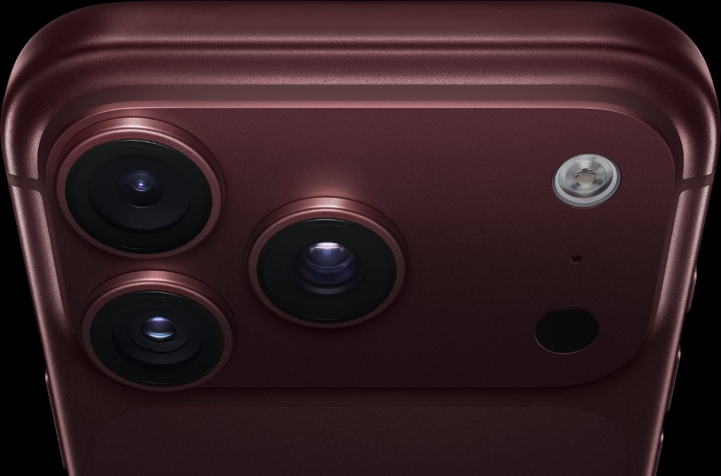 iPhone Pro camera system in deep burgundy